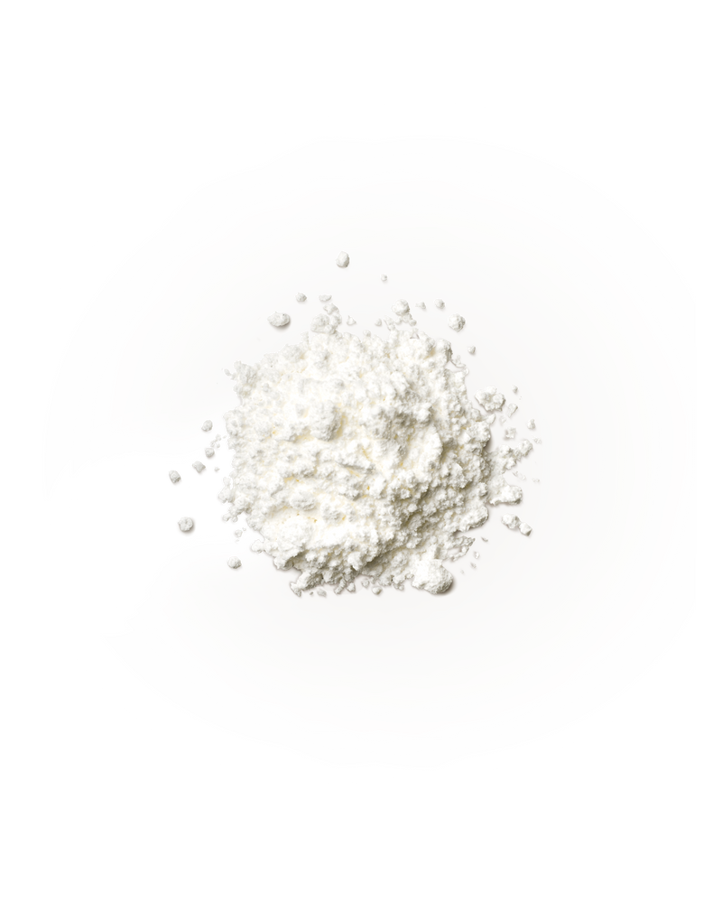 A small pile of loose micronized creatine monohydrate powder on a plain white background.